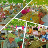 Unter schattigen Platanen stärken sich die Radler für die Heimfahrt